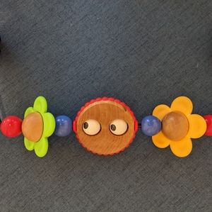 Used condition wooden Baby Bjorn Toy Bar